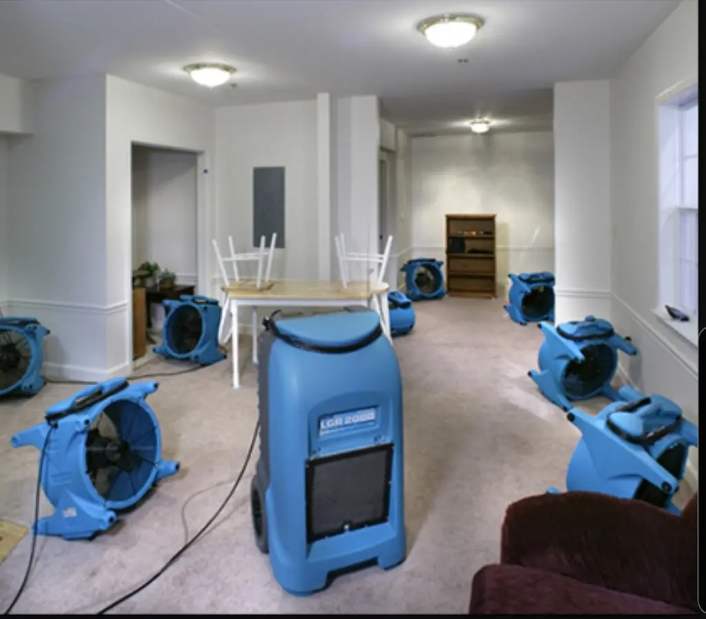 Air movers and dehumidifier setup for Water Damage Restoration in Baltimore
